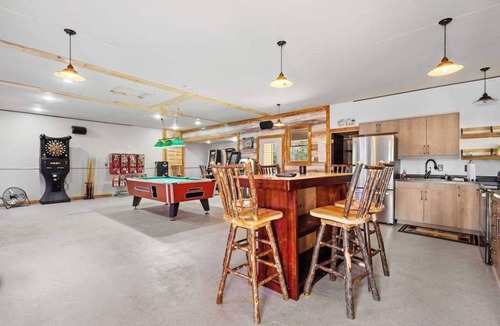 Conover House | Modern dog-friendly cabin with hot tub, gas fireplace, patio, grill, & washer/dr