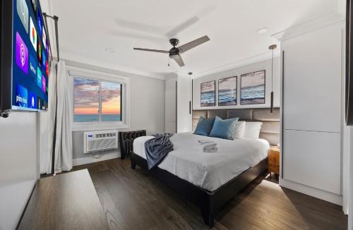 Myrtle Beach Apartment | Modern Escape - Luxe Oceanfront 2BR with Epic Kitchen, Pool, Parking
