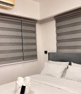 Kaunlaran Apartment | Modern Executive 1BR with Huge Balcony and Sunset View