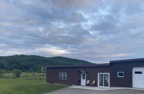 Caroline House | Modern farmhouse centrally located 25 minutes from Ithaca and the Finger Lakes.