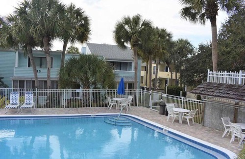 Butler Beach Condo | Modern First-floor Condo with Pool, Porch, Beach Access.