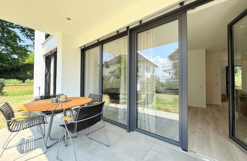 Unteruhldingen Apartment | Modern Harmony suite with covered terrace near the lake and beach in Uhldingen-