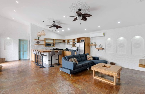 Potrero House | Modern Home with Chic Bohemian Style and “Zen” Outdoor Oasis with Swimming Pool and Tiki-Style Dining Space