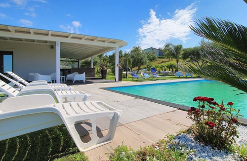 Campofelice di Roccella Villa | Modern property with Private Golf Practice, Private Pool, Garden, WiFi, Sea VIew