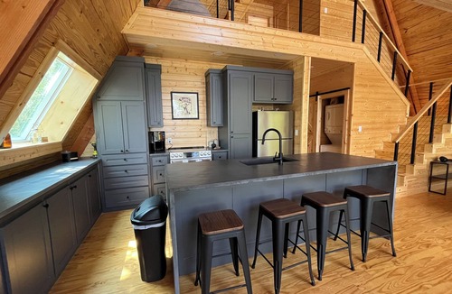 Dogwood Cabin | Modern lakefront cabin nestled in the piney woods of East Texas. Pet Friendly!
