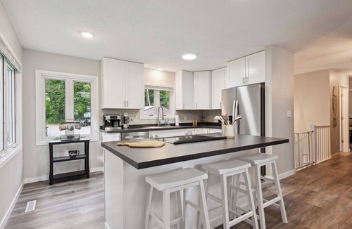 Deerwood Cabin | Modern Lakefront Home with Game Room, Large Deck and Sauna!
