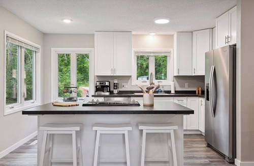Deerwood Cabin | Modern Lakefront Home with Game Room, Large Deck and Sauna!