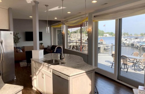 Macatawa House | Modern Lakefront Loft with Private Deck at Eldean Shipyard near Macatawa, Michigan