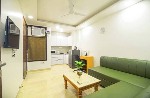 Gurugram Apartment | Modern loft overlooking hills and park