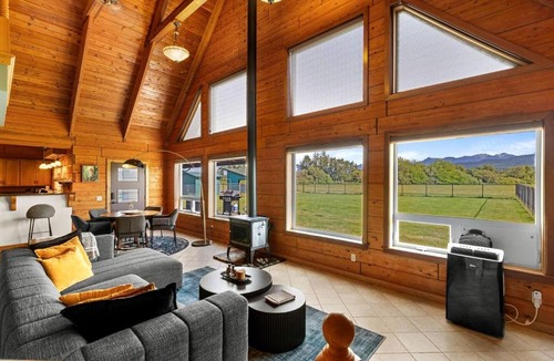 Sequim House | Modern Log Cabin with Cozy Fireplace Retreat & Views in Sequim, Washington