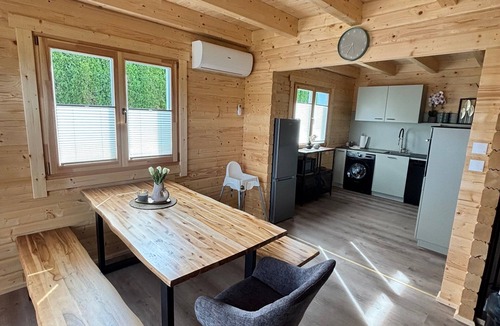 Lisberg House | Modern log cabin with sauna, natural views, and chalet charm