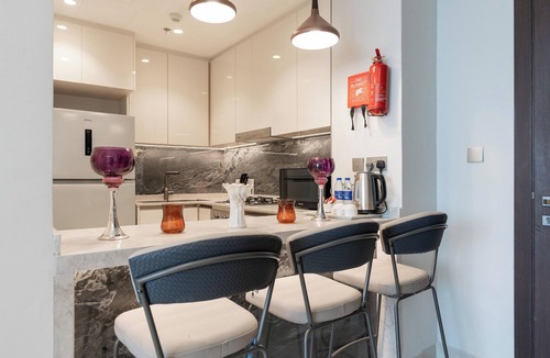 Business Bay Apartment | Modern Luxe 1BR Partial Burj View & King Bed
