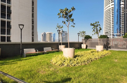 Business Bay Apartment | Modern Luxe 1BR Partial Burj View & King Bed