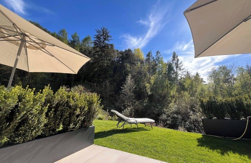 Sant'Andrea in Monte Apartment | modern, luxury, private entrance, garden, terrace, and stunning mountain views.