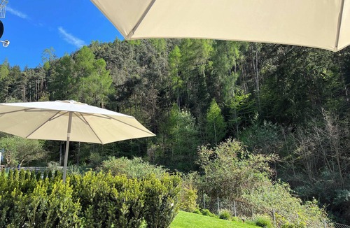 Sant'Andrea in Monte Apartment | modern, luxury, private entrance, garden, terrace, and stunning mountain views.