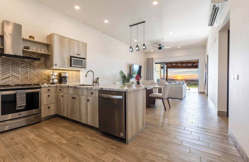 Sunset Beach Apartment | Modern luxury & unforgettable sunsets at Mavila - huge patio w pool