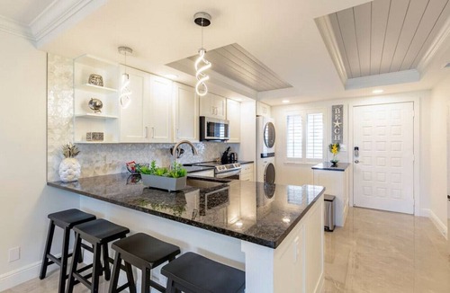 Jupiter Condo | Modern Luxury, Waterfall, Pool, 1/2 mile to Beach