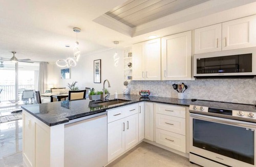 Jupiter Condo | Modern Luxury, Waterfall, Pool, 1/2 mile to Beach