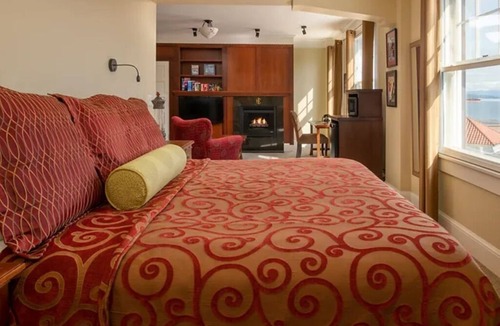 Astoria Hotel | Modern Meets Victorian: Room w/Handcrafted Cabinetry & Heated Tile Floors