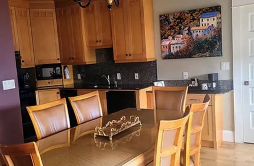 Astoria Hotel | Modern Meets Victorian: Room w/Handcrafted Cabinetry & Heated Tile Floors