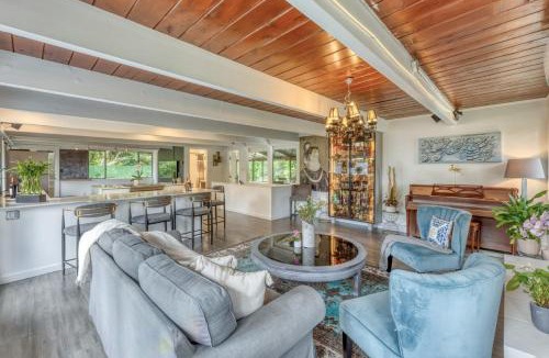 Upper Lonsdale House | Modern Mid-Century Home with Solarium, Deck, and Jacuzzi