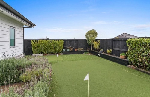 Wharewaka House | Modern, newly furnished house, with own putting green.