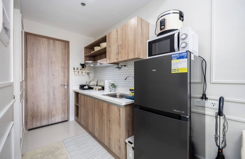 Lapu-Lapu Condo | Modern Nordic Studio with Balcony and Pool in Primeworld District Near Airport