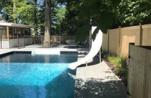 Peconic House | Modern North Fork Retreat with massive pool and Private Beach Access