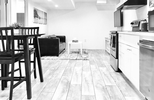 Alcona Apartment | Modern One Bedroom Basement Suite With Parking