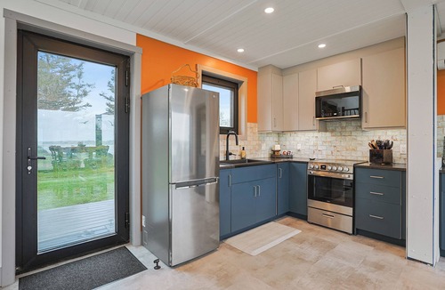 Oyster Bed House | Modern PEI Shipping Container Retreat with Multiple Decks & Stunning Views