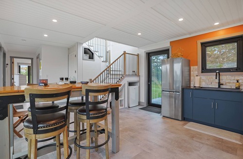 Oyster Bed House | Modern PEI Shipping Container Retreat with Multiple Decks & Stunning Views
