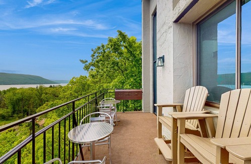 Canandaigua House | Modern penthouse condo with beautiful sunrises, lake view, & balcony