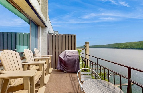Canandaigua House | Modern penthouse condo with beautiful sunrises, lake view, & balcony