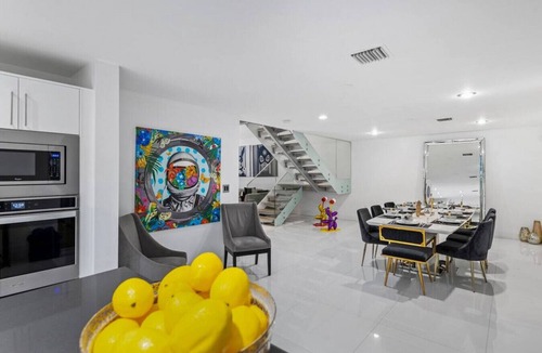 Venetian Islands House | Modern SoBe Mansion with Poolside Cabana