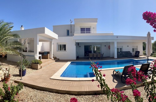 Binibeca Villa | Modern, spacious, private, views of olive groves and sunset from pool house