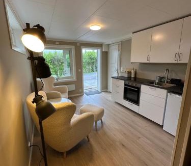 Hesseng Apartment | Modern studio apartment with wood-fired sauna