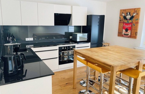 Grettstadt Apartment | Modern studio apartment (110 sqm) with balcony and four bedrooms