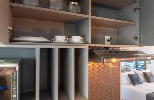 Osasco Apartment | Modern studio apartment with queen-size bed in Cityplex Osasco.