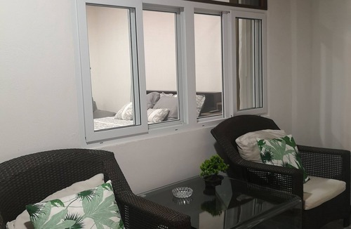 San Antonio de Belen Apartment | Modern Studio Clean Safe Area Fast Wifi with Patio