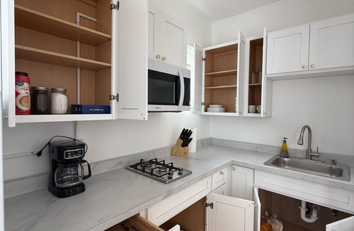 East Avenue Apartment | Modern studio in Downtown Rochester with a full kitchen and Smart TV, steps from High Falls