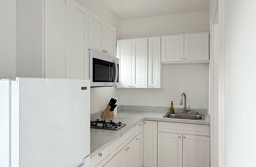 East Avenue Apartment | Modern studio in Downtown Rochester with a full kitchen and Smart TV, steps from High Falls