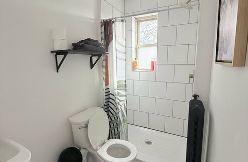 East Avenue Apartment | Modern studio in Downtown Rochester with a full kitchen and Smart TV, steps from High Falls