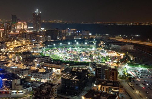Al Barsha Apartment | Modern Studio on 27th Floor with Miracle Garden Views