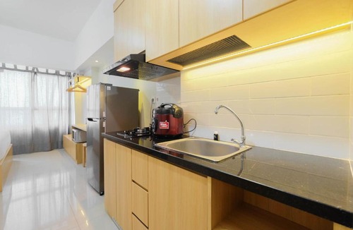 Bekasi Apartment | Modern Studio @ Springlake Summarecon Apartment By Travelio