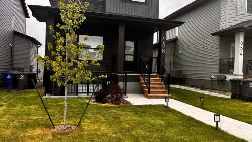 West Central Saskatchewan Apartment | Modern, Stylish & Cozy Brighton Walkout Retreat, Sleeps 6
