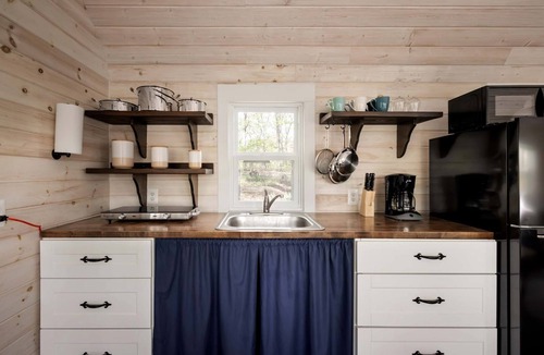 Great Cacapon Cabin | Modern Tiny Cabin with Game Room & Fire Pit in West Virginia