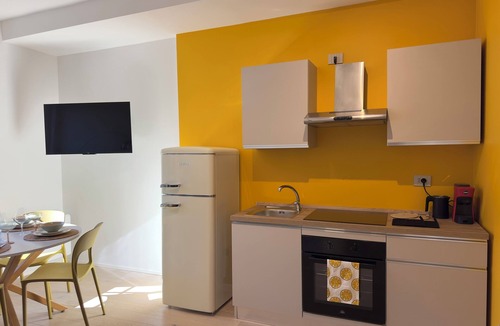 Borgo San Leonardo Apartment | Modern two-room apartment central borfuro kitchen living room design