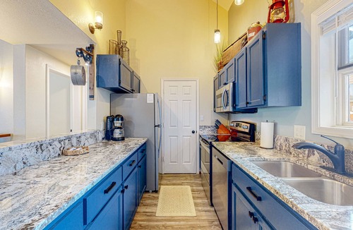 Purgatory Condo | Modern two-story condo with balcony, hot tub access, & fireplace