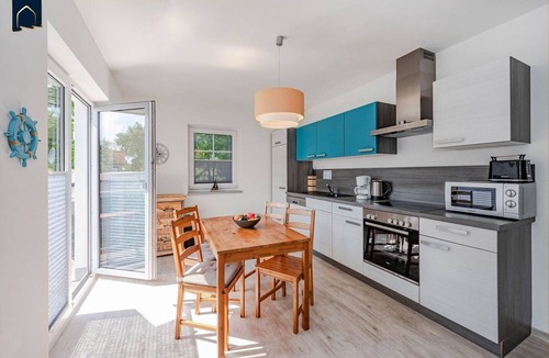 Heringsdorf House | Modern vacation apartment in Heringsdorf with balcony & garden view near the beach -