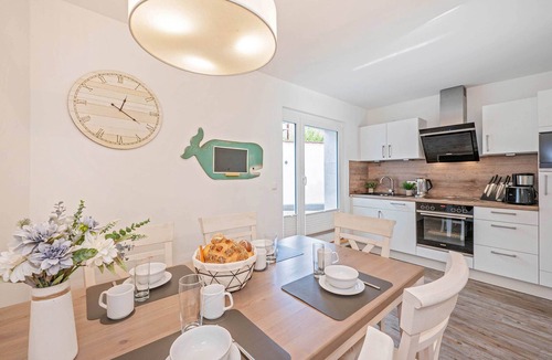Kamminke Apartment | Modern vacation apartment by the lake with terrace and garden view on Usedom